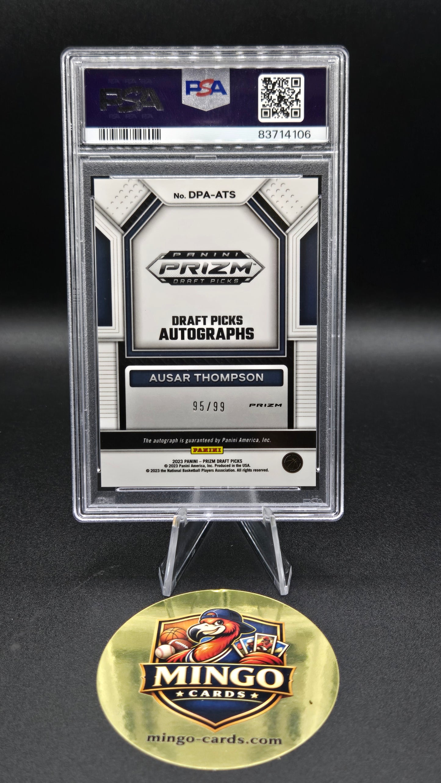 A sealed Panini 2023 Draft Pick Autographs card graded PSA 9, displayed on a black background next to a gold Mingo Cards collectible medallion.