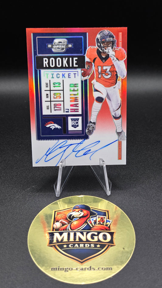 An autographed Denver Broncos football trading card displayed next to a round gold Mingo Cards promotional coin on a black background.
