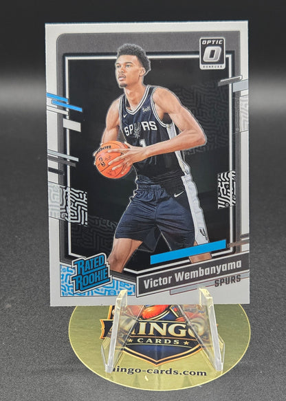 Basketball trading card with a player in action on a dark background