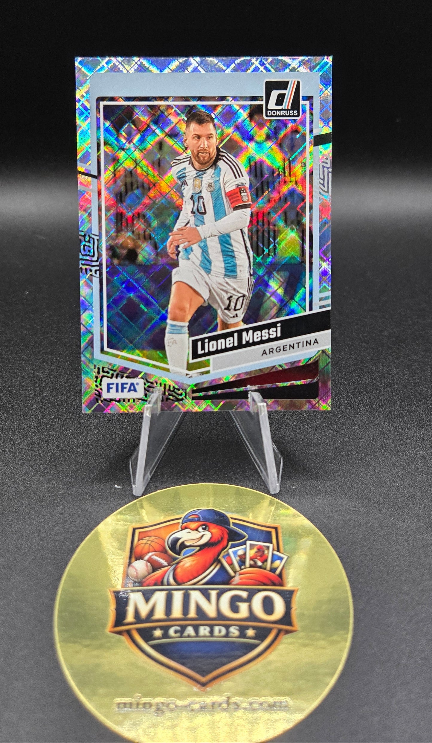 Colorful trading card with a gold Mingo label on a black background