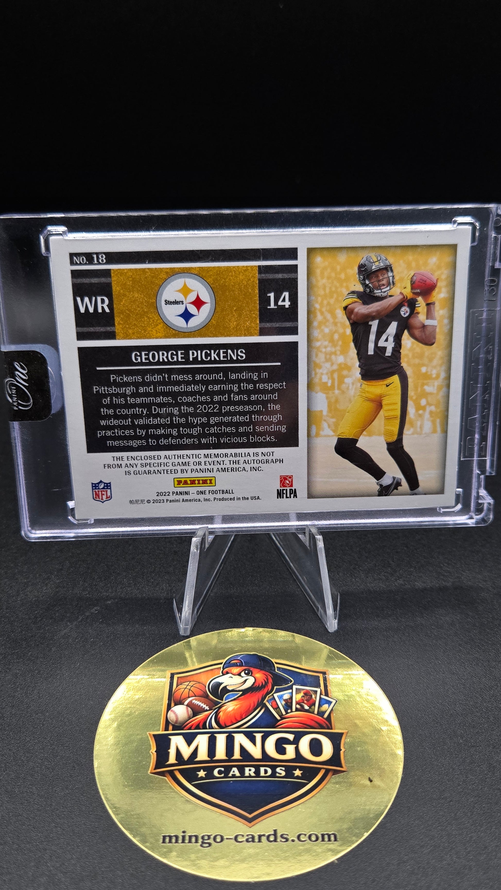 A collectible football trading card in a clear protective case, shown next to a round gold Mingo Cards logo medallion on a black background.